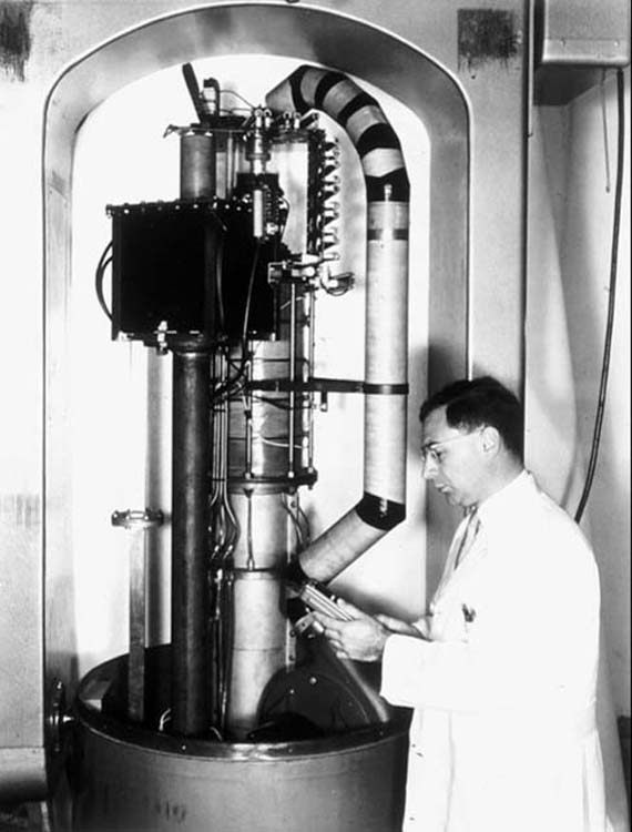 Henry Kaplan with an early model of a linac